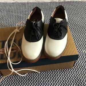 School issue black and white oxfords. Size 12
